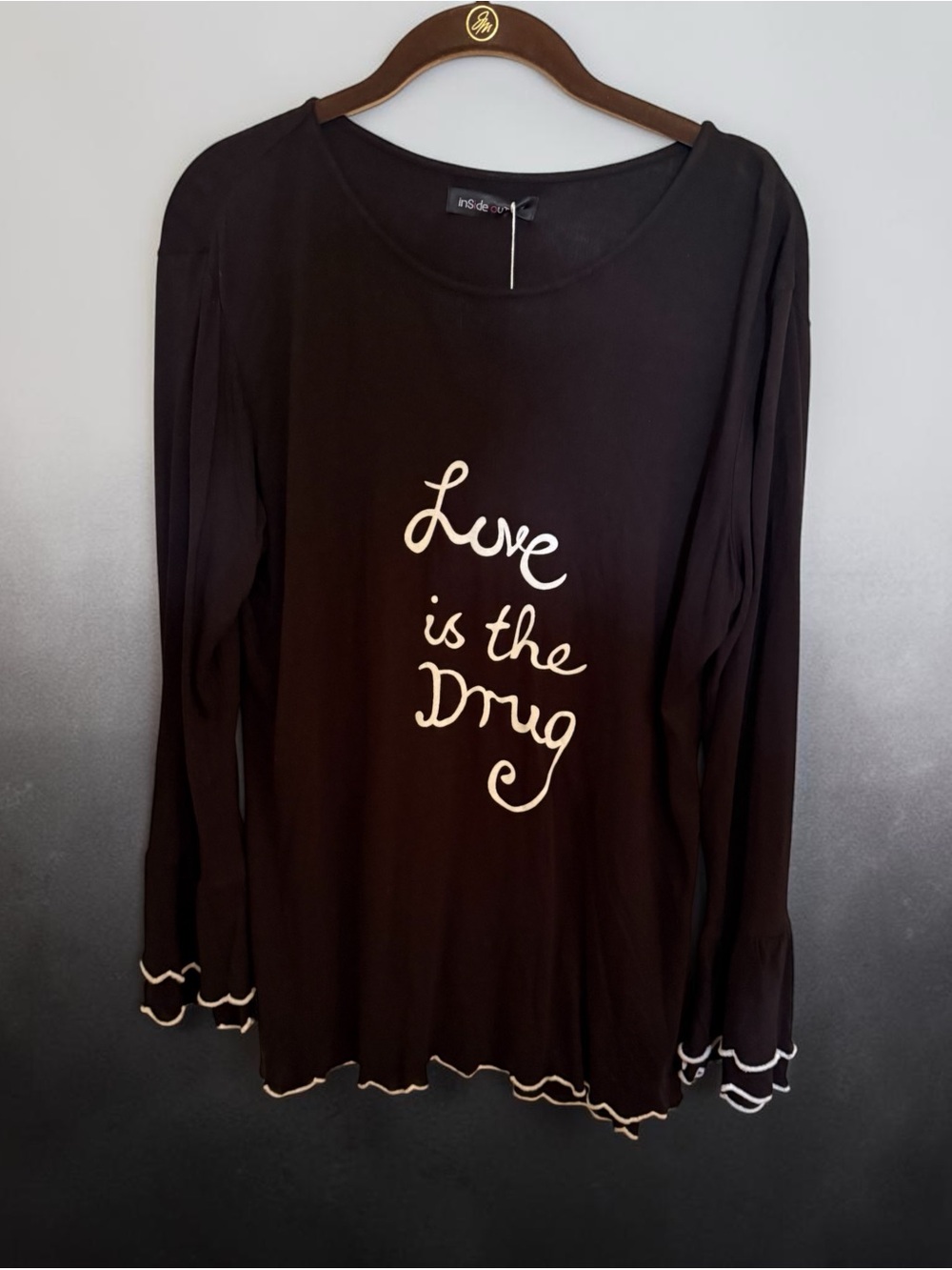 Black 'Love is the Drug' Long Sleeve Knit Top